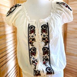 Embroidered blouse.
